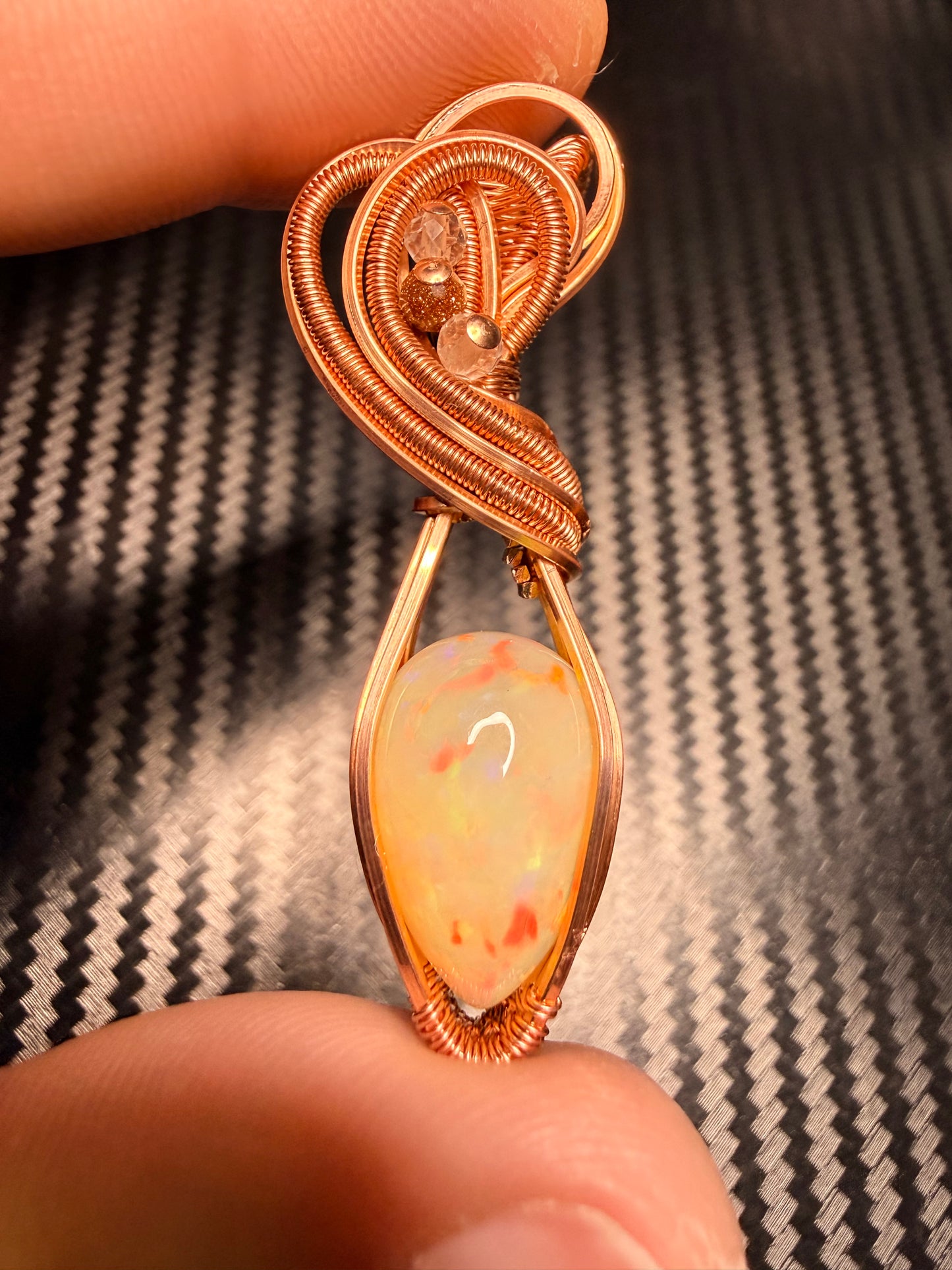 3EO) Ethiopian Welo Opal full flash, 8.15 carats in polished copper with clear quartz & goldstone accents