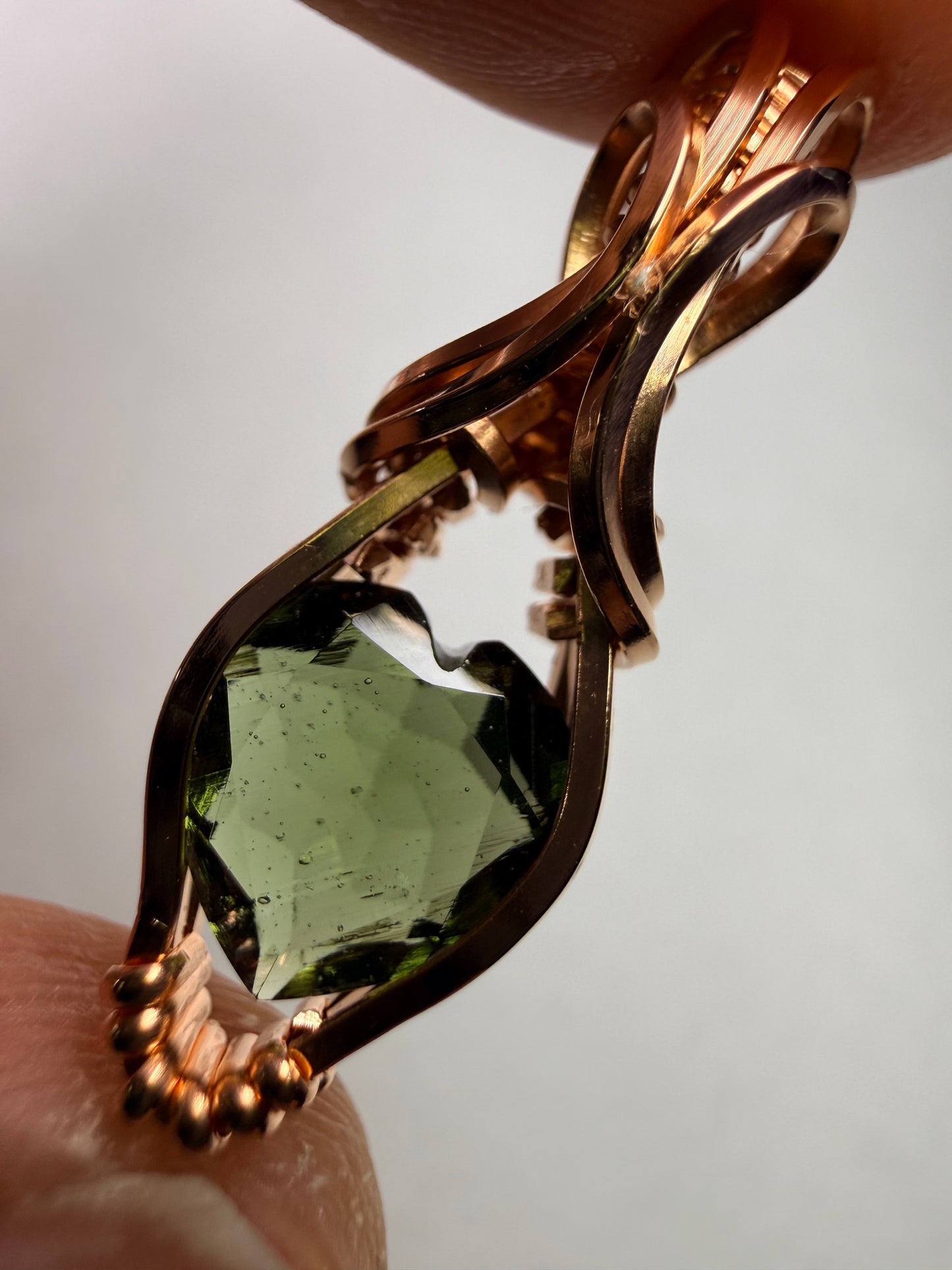 Moldavite Heart Faceted Pendant In Copper
