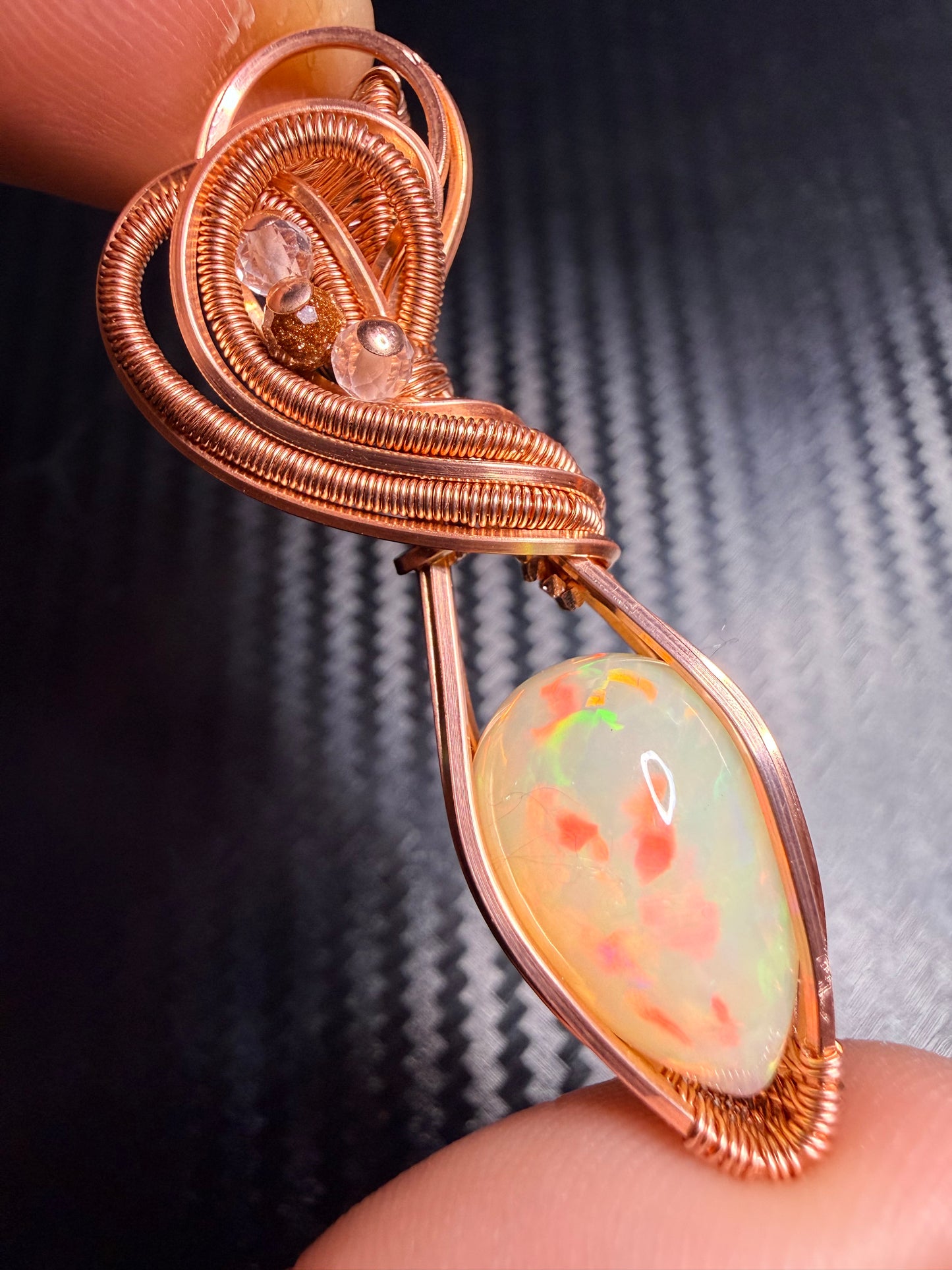 3EO) Ethiopian Welo Opal full flash, 8.15 carats in polished copper with clear quartz & goldstone accents