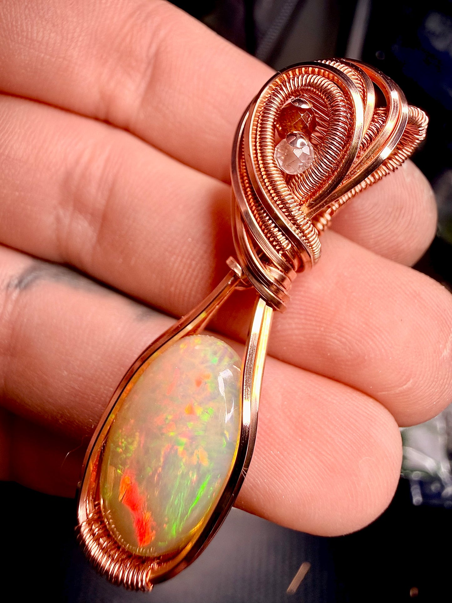 Ethiopian Welo Opal 6.60 Carats in polished copper with orange garnet & quartz accents.