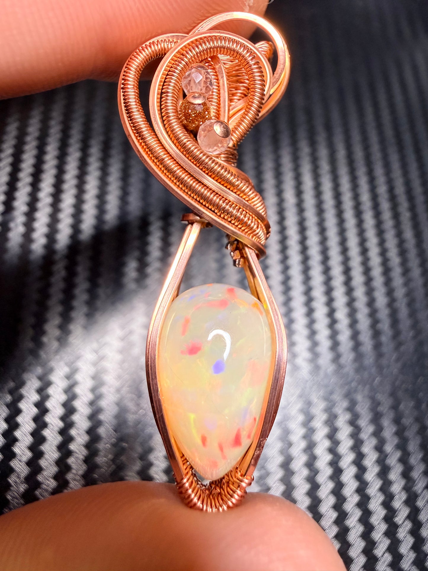 3EO) Ethiopian Welo Opal full flash, 8.15 carats in polished copper with clear quartz & goldstone accents