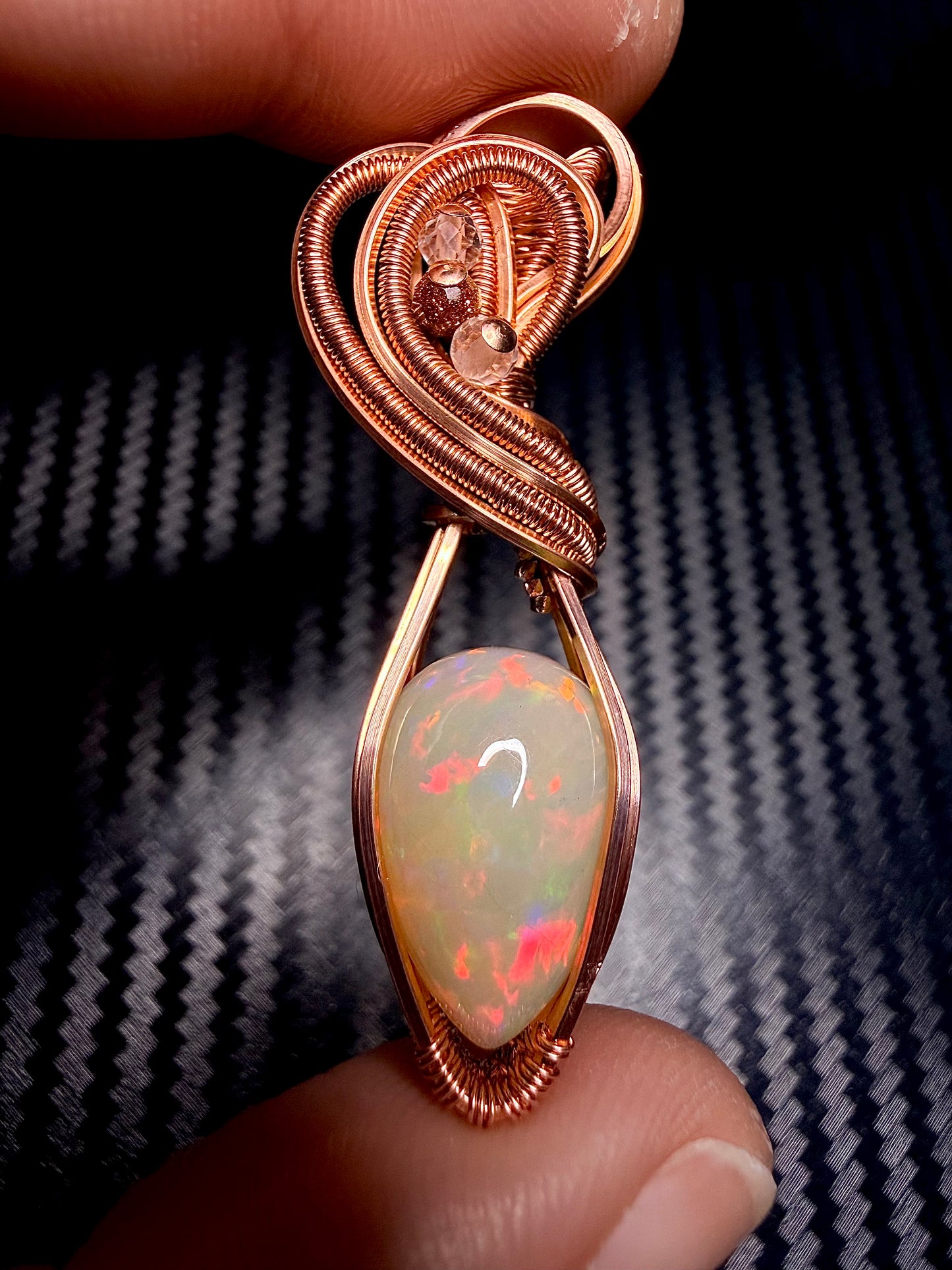 3EO) Ethiopian Welo Opal full flash, 8.15 carats in polished copper with clear quartz & goldstone accents