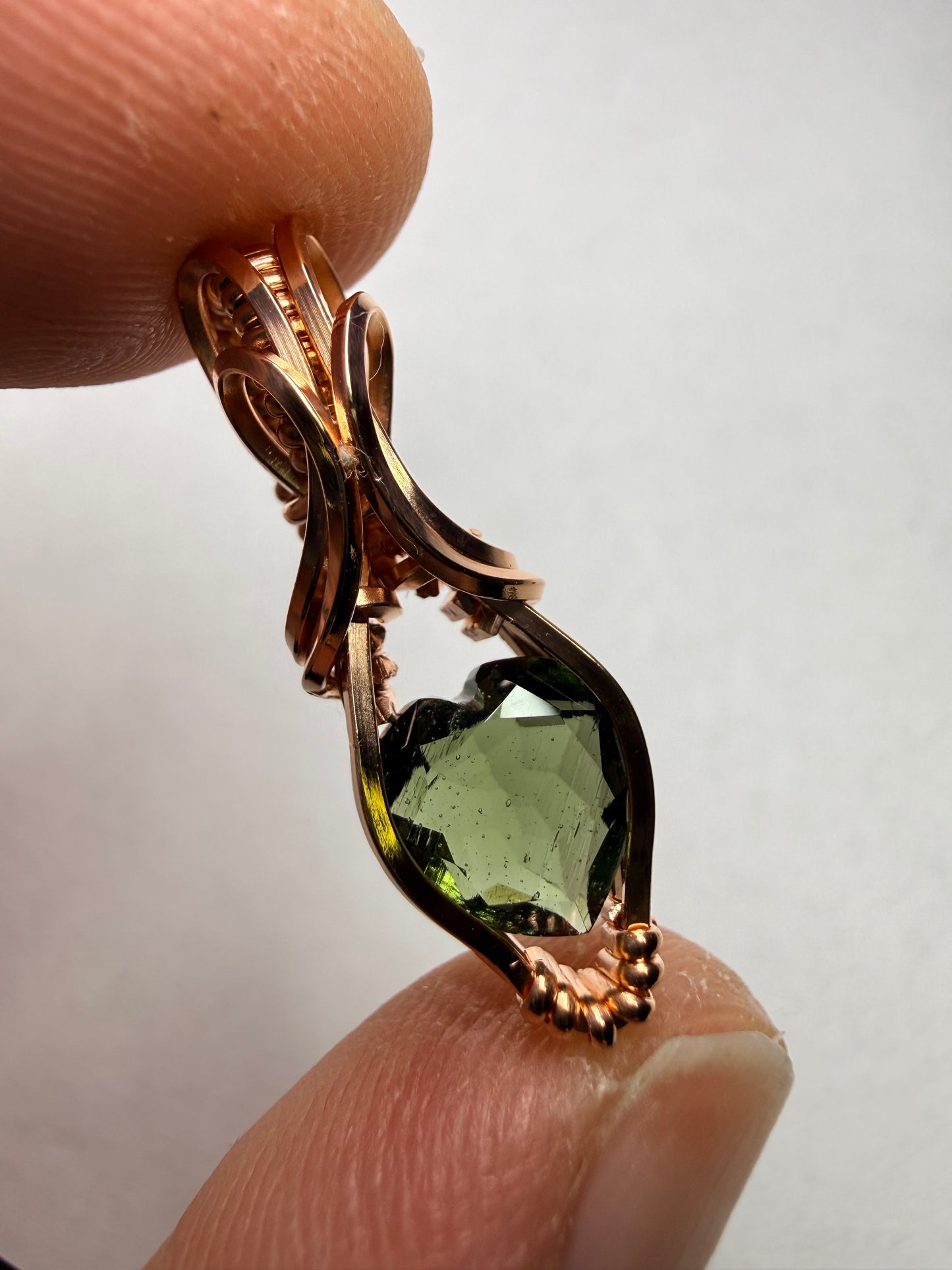 Moldavite Heart Faceted Pendant In Copper