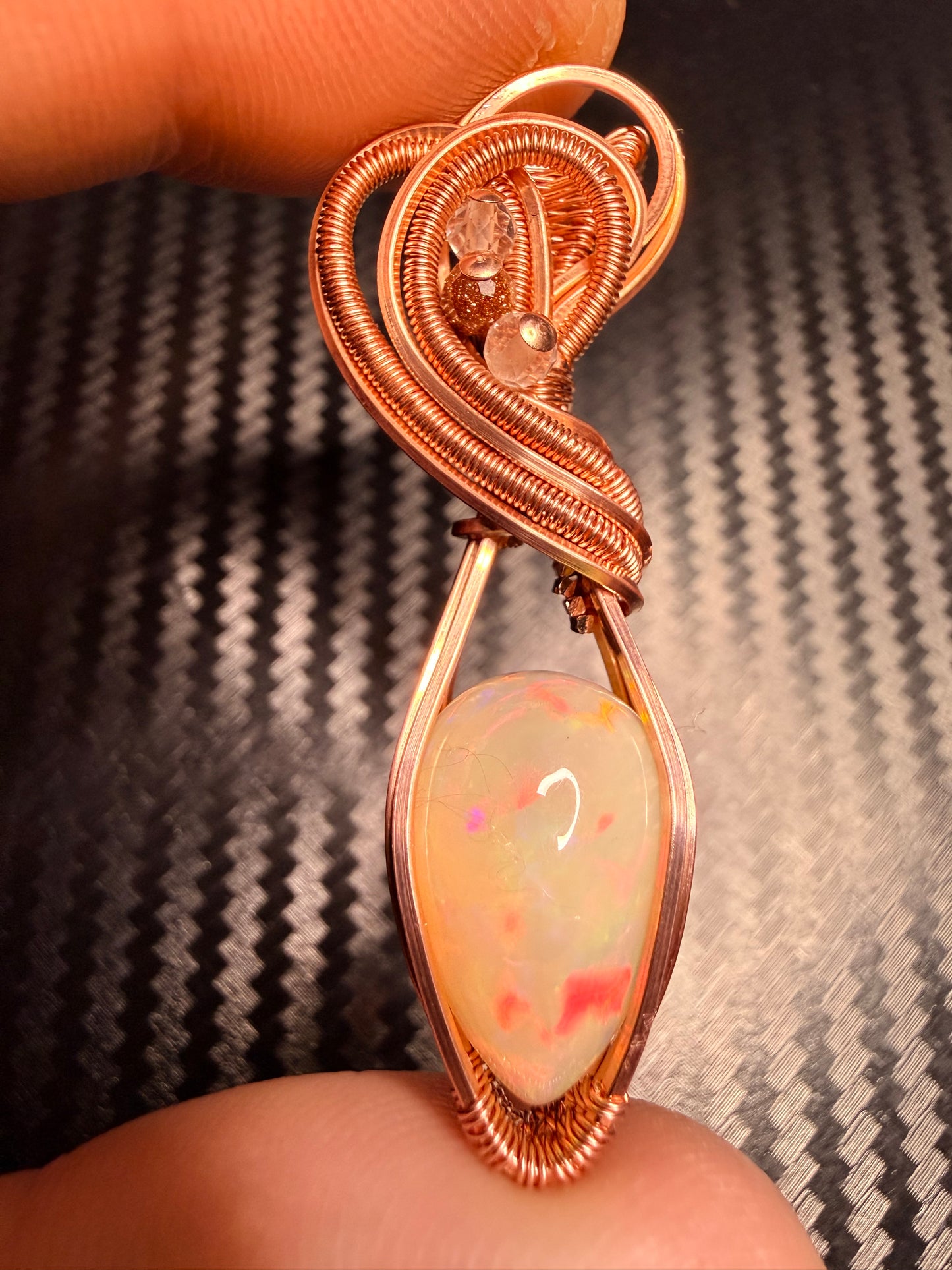 3EO) Ethiopian Welo Opal full flash, 8.15 carats in polished copper with clear quartz & goldstone accents